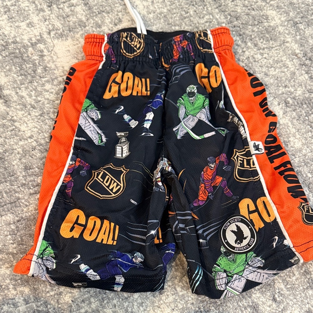 Kids Hockey Print Athletic Shorts with Orange Side Panels
